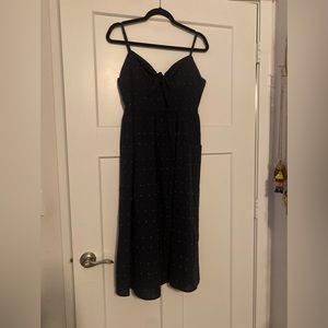 Francesca’s navy midi dress.
